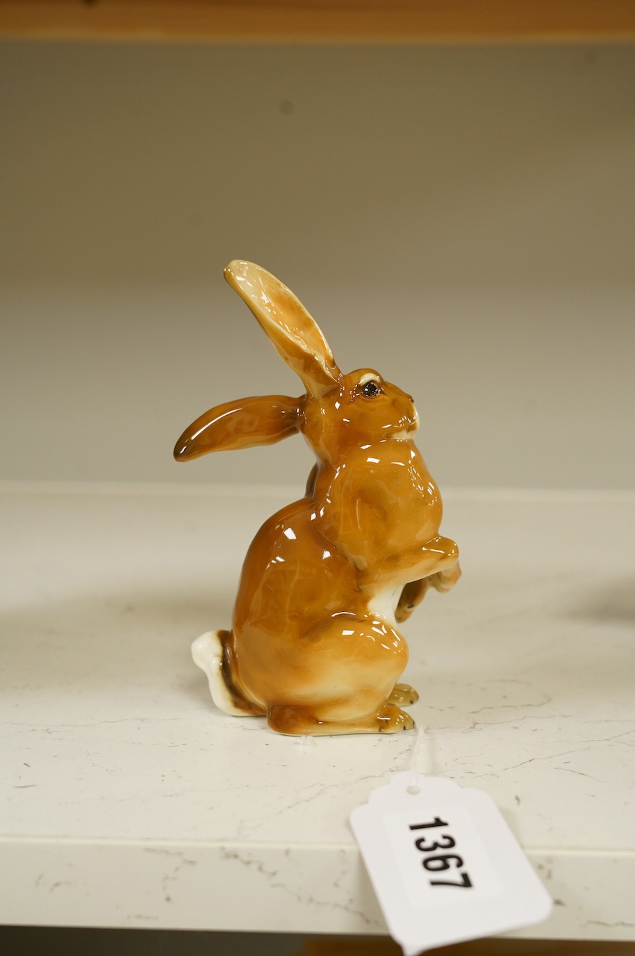 A Hutschenreuther No.14 Standing Hare, impressed mark Tooter, 14cm high. Condition - good